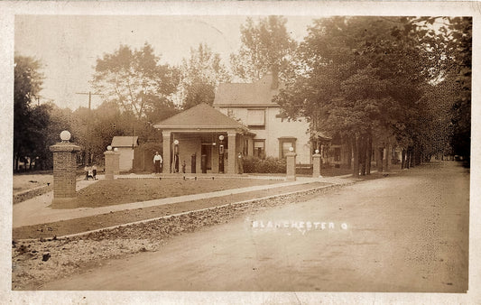 Circa 1910. Service Station at the Point at Center Street and Main Street. Blanchester.